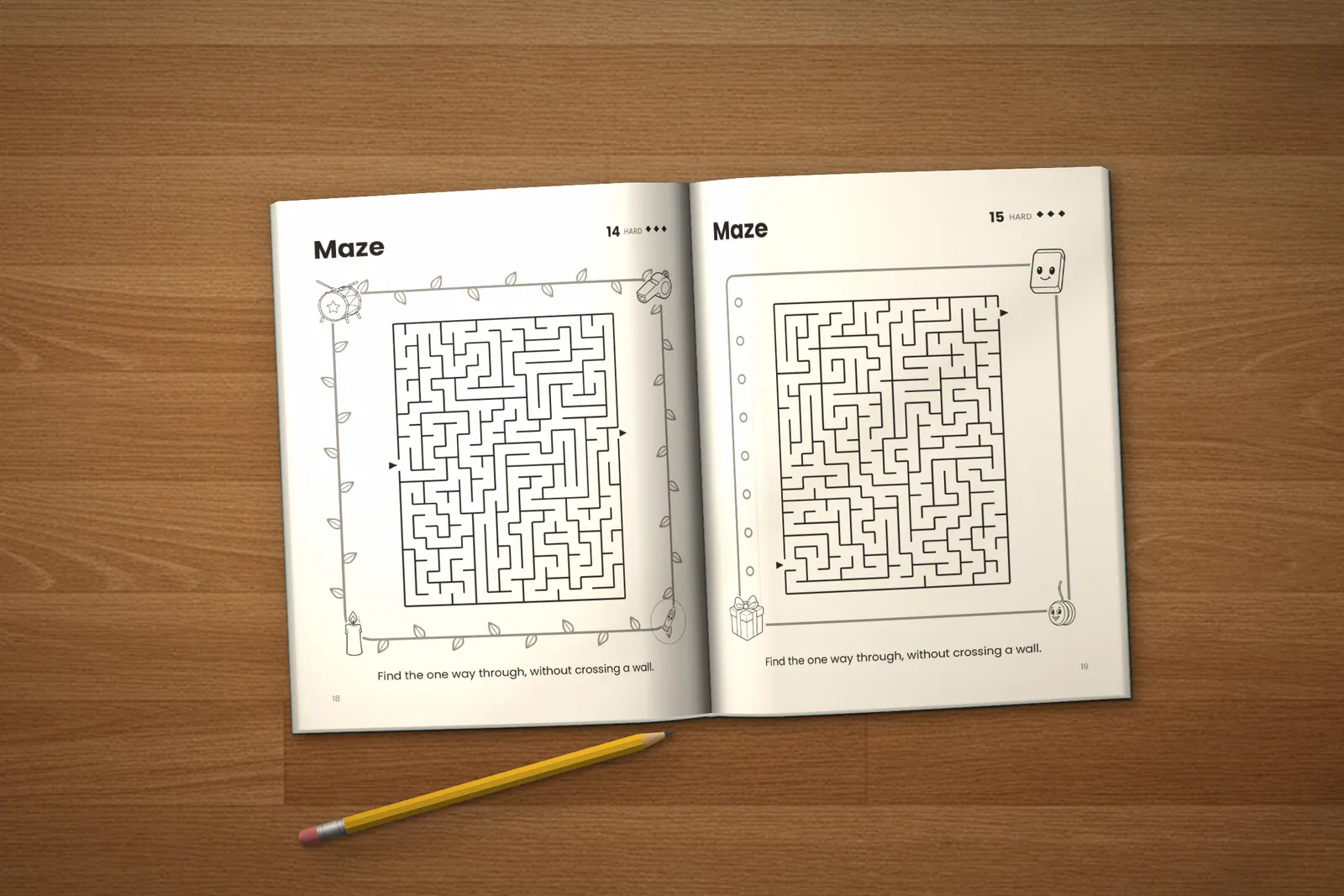 Mazes for Kids: Hard lying open on a wooden table, showing two hard mazes, next to a yellow pencil