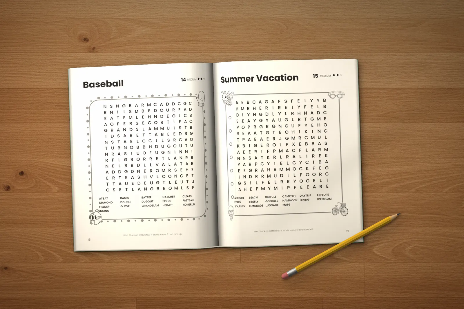 Word Search for Kids: Medium lying open on a wooden table, showing two word searches (“Baseball” and “Summer Vacation”), next to a yellow pencil