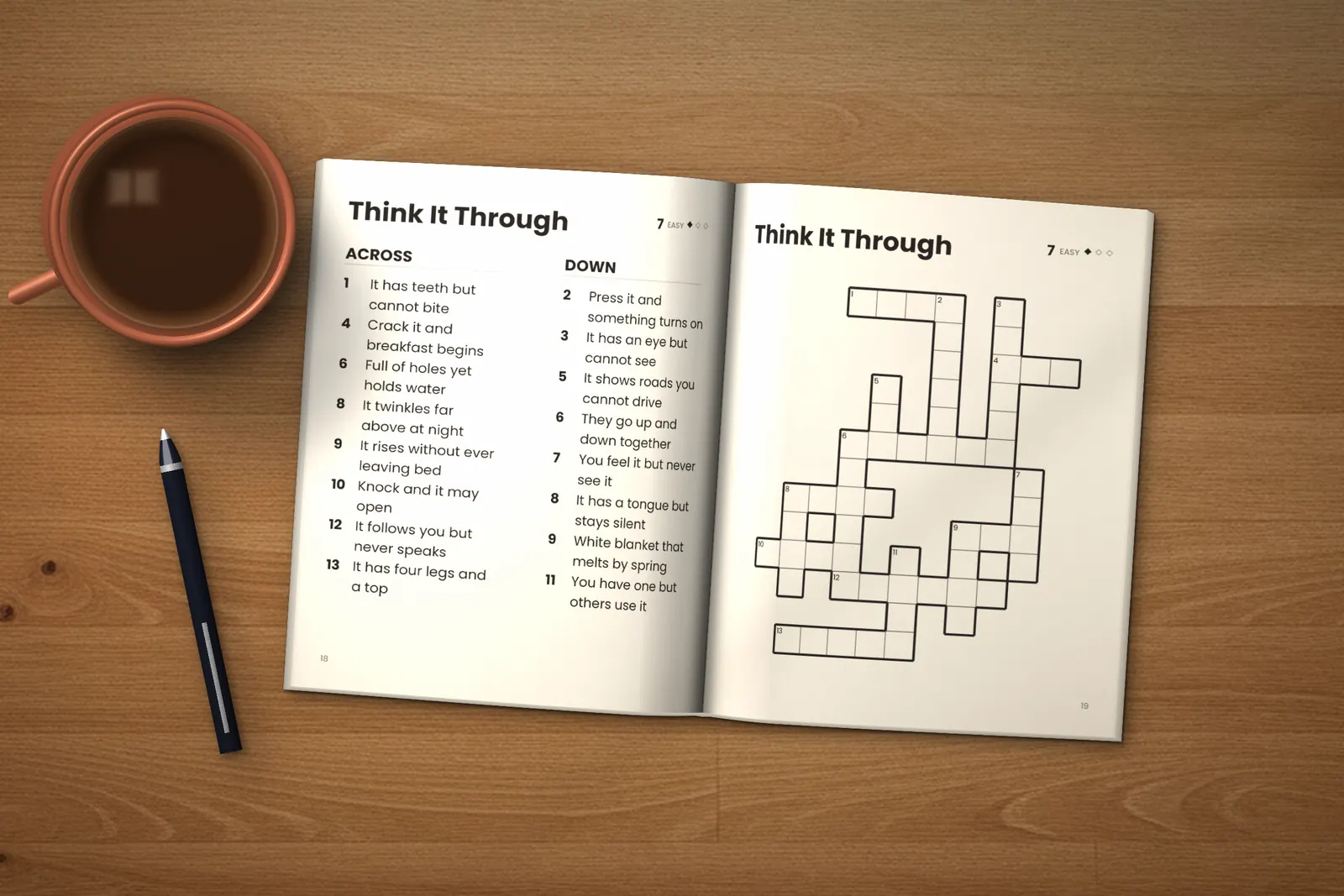 Large Print Crossword Puzzles for Seniors: Easy, Medium & Hard lying open on a wooden table, showing the clues and grid of the “Think It Through” crossword, next to a cup of coffee and a pen