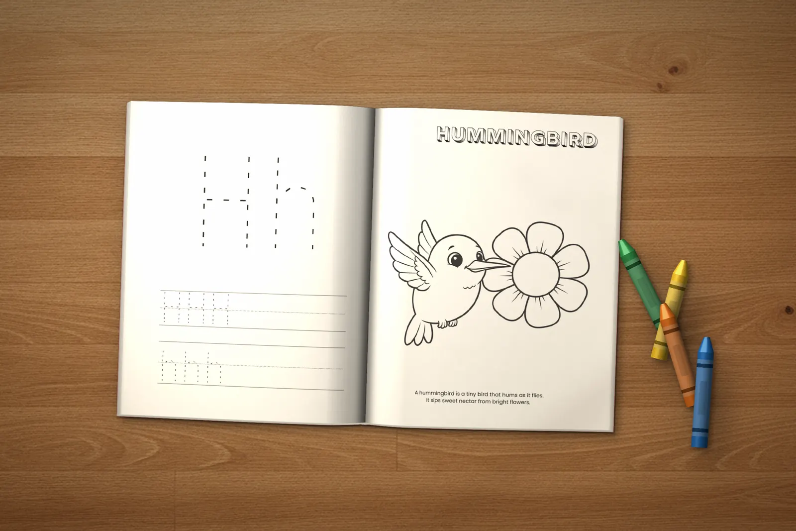 San Diego Activity Book for Kids (ages 2-5) lying open on a wooden table, showing a letter H tracing page and a Hummingbird coloring page, with crayons beside it